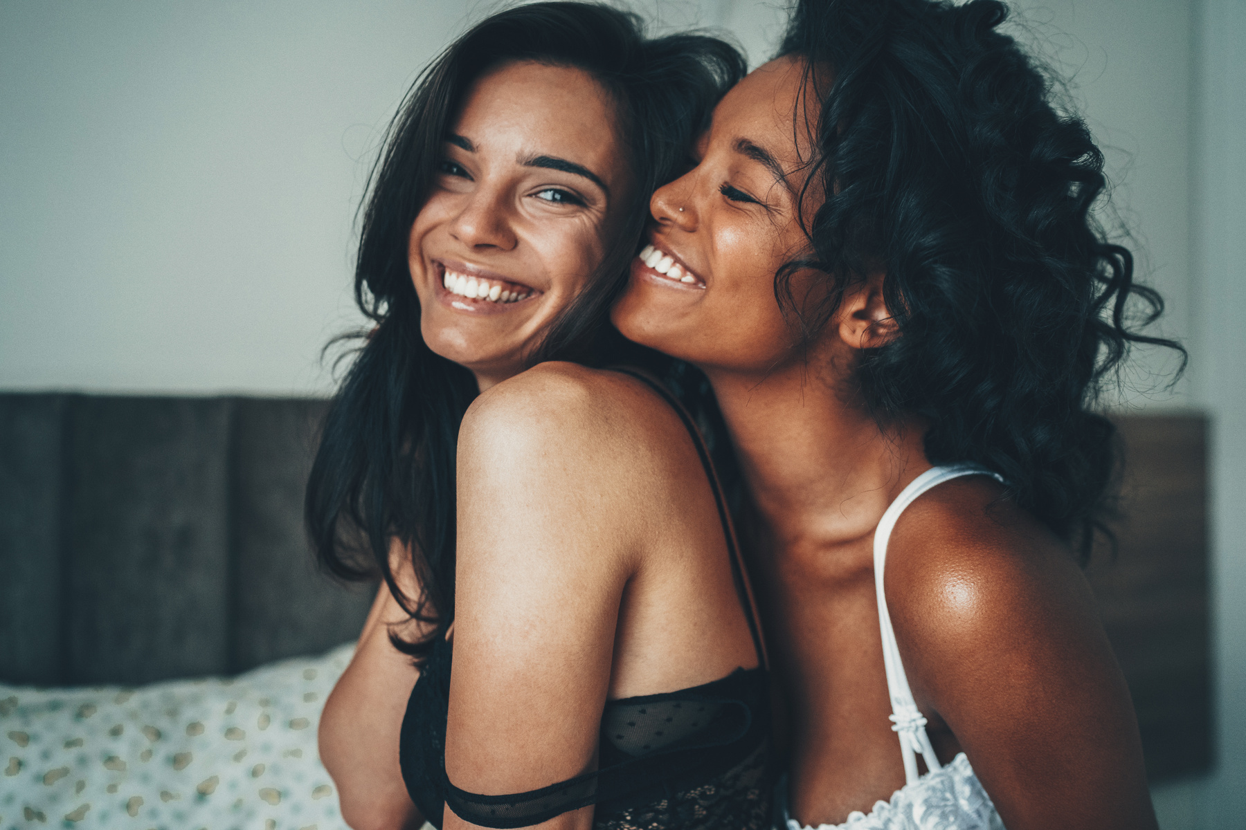 Lesbian Couple in Lingerie Embracing Each Other